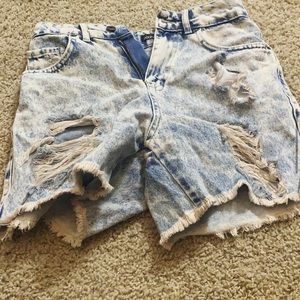 Washed out blue ripped biker jean shorts